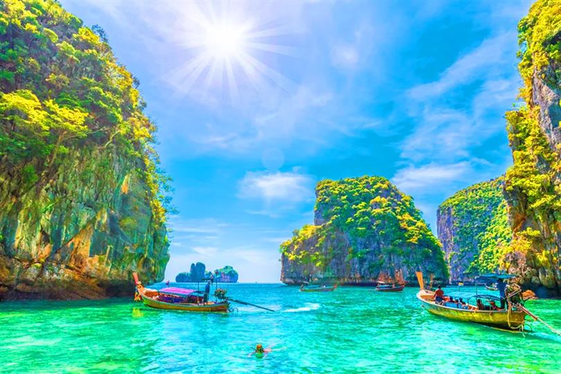 Scenic view of Bangkok’s skyline, Pattaya’s beaches, and Phuket’s tropical islands – Thailand’s top travel destinations.